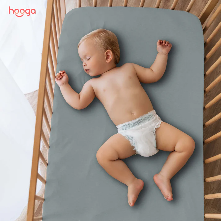 Grounding Baby Crib Sheet designed to improve your baby’s sleep quality and overall health. This crib sheet connects your baby to the Earth’s natural energy, promoting reduced inflammation and better well-being. Made from 94% cotton and 6% silver fiber, it ensures comfort and effective grounding.