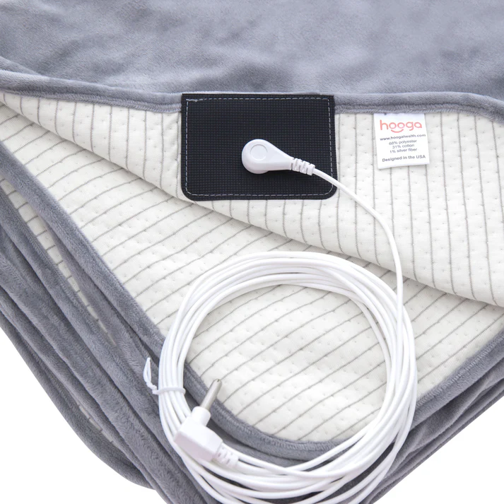 Durable and soft Grounding Blanket made from a polyester/cotton blend with conductive silver fiber and a soft, fuzzy 100% polyester exterior. This grounding blanket is designed for long-lasting use, providing continuous health benefits from grounding.