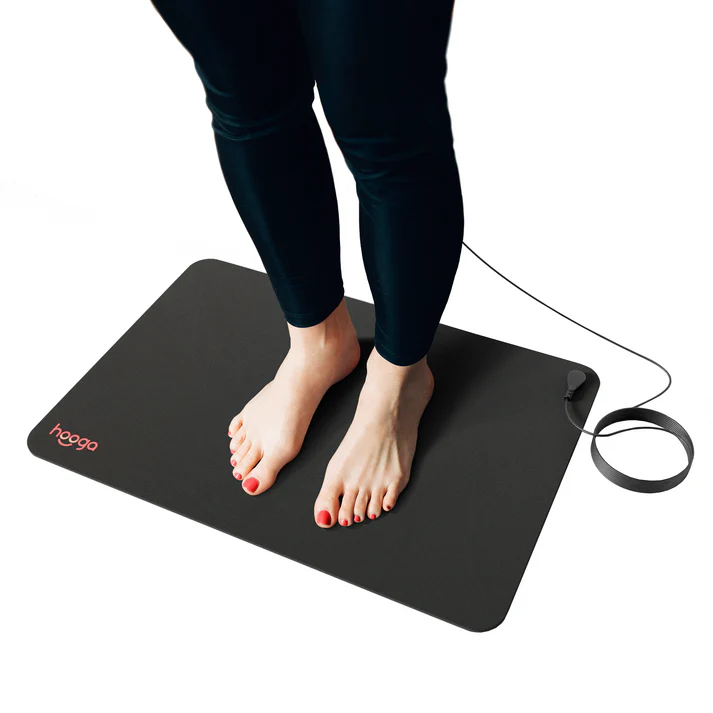 Grounding Multipurpose Mat made from durable rubber and conductive carbon-infused vegan leather. This grounding mat provides excellent conductivity and comfort, ensuring you can experience the health benefits of grounding, including reduced inflammation and improved sleep quality.