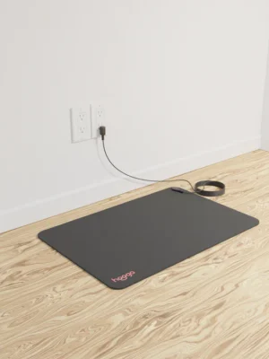 Premium Grounding Mat designed for optimal health benefits. This mat features a durable rubber backing and conductive carbon-infused vegan leather, providing excellent conductivity and comfort. Enhance your well-being by connecting with the Earth's natural energy.