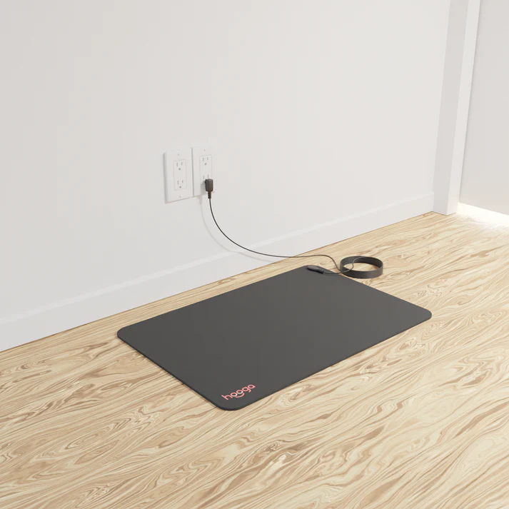 Premium Grounding Mat designed for optimal health benefits. This mat features a durable rubber backing and conductive carbon-infused vegan leather, providing excellent conductivity and comfort. Enhance your well-being by connecting with the Earth's natural energy.